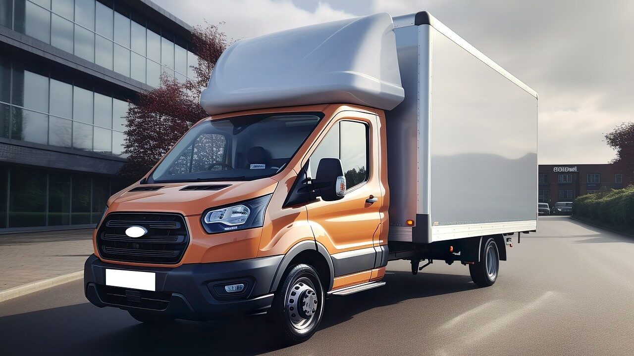 A logistics service truck on the road, illustrating the question 'What Are Logistics Services?' with a modern delivery vehicle.