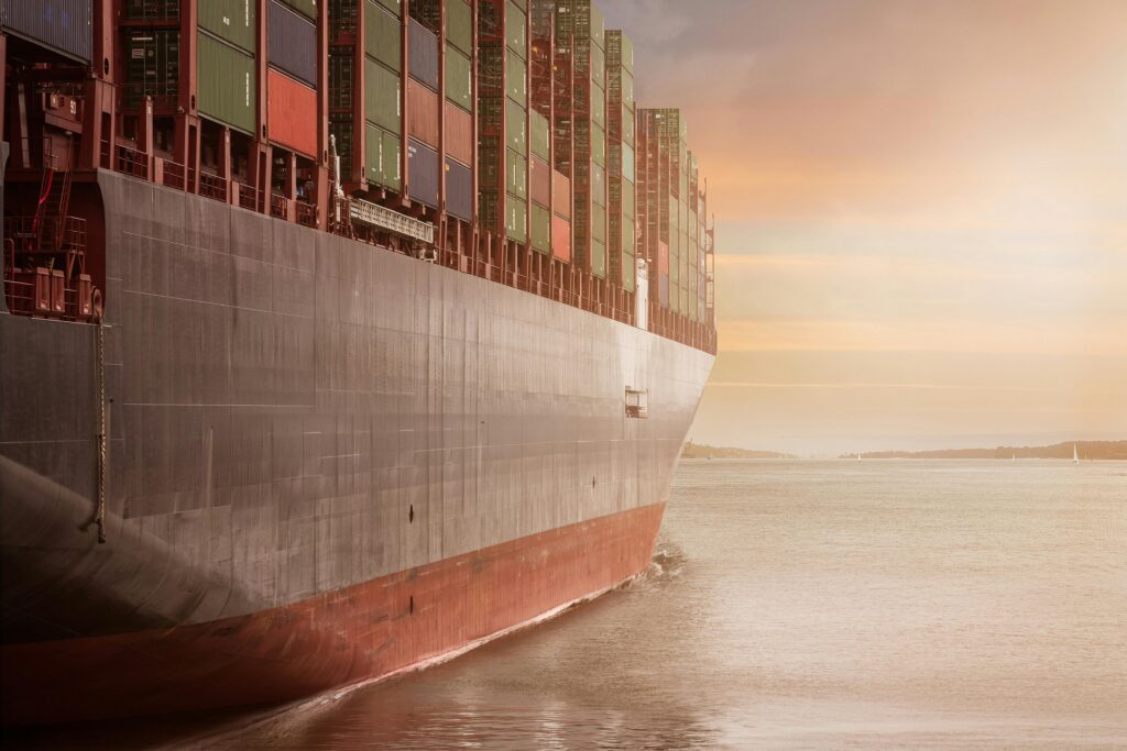 NYSHEX shipping rate indexes displayed on a digital dashboard with cargo ships and containers in the background, representing innovation and transparency in ocean freight logistics.